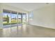 Bright Gathering room with sliding glass doors leading to the backyard at 176 Flag Lilly Ln, Umatilla, FL 32784