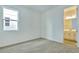 Bedroom with adjacent bathroom access at 176 Flag Lilly Ln, Umatilla, FL 32784
