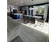 Open concept dining room with kitchen and living room views at 12351 Northover Loop, Orlando, FL 32824