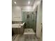 Elegant bathroom with a large walk-in shower at 12351 Northover Loop, Orlando, FL 32824