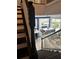 Elegant staircase overlooking the dining and living room at 12351 Northover Loop, Orlando, FL 32824