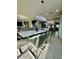 Elegant dining room features a large table, modern chandelier, and kitchen view at 12351 Northover Loop, Orlando, FL 32824