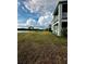 Two-story house with balcony and lake view at 12351 Northover Loop, Orlando, FL 32824