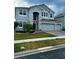 Two story home with light blue exterior at 12351 Northover Loop, Orlando, FL 32824
