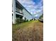 Two-story house with balcony and grassy backyard at 12351 Northover Loop, Orlando, FL 32824