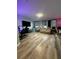 Open concept living area with modern wall decor at 12351 Northover Loop, Orlando, FL 32824