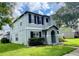 Two-story house with gray siding, black shutters, and a well-maintained lawn at 2039 Florida Soapberry Blvd, Orlando, FL 32828