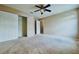 Bedroom with ceiling fan and double door closet at 2039 Florida Soapberry Blvd, Orlando, FL 32828