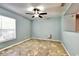 Simple living room with tile floors and ceiling fan at 2039 Florida Soapberry Blvd, Orlando, FL 32828