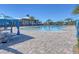 Community resort-style pool with lounge chairs and umbrellas at 2700 Greenlands St, Saint Cloud, FL 34772