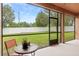 Relaxing screened patio with view of backyard at 840 Crooked Branch Dr, Clermont, FL 34711