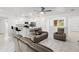 Modern kitchen with stainless steel appliances and an island with seating at 840 Crooked Branch Dr, Clermont, FL 34711