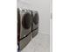 Laundry room with Samsung washer and dryer set at 840 Crooked Branch Dr, Clermont, FL 34711