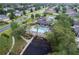 Community pool, playground, and surrounding neighborhood at 840 Crooked Branch Dr, Clermont, FL 34711