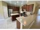 Modern kitchen with stainless steel appliances and ample cabinetry at 3601 Daydream Pl, Saint Cloud, FL 34772