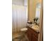 Bathroom with tub shower and single vanity at 3601 Daydream Pl, Saint Cloud, FL 34772