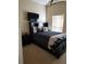Bedroom with a queen-size bed and TV at 3601 Daydream Pl, Saint Cloud, FL 34772