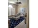 Cozy living room boasts comfortable seating and a calming color palette at 3601 Daydream Pl, Saint Cloud, FL 34772