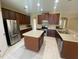 Modern kitchen with stainless steel appliances and an island at 3601 Daydream Pl, Saint Cloud, FL 34772