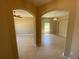 Spacious hallway with tile floors and archways leading to other rooms at 3601 Daydream Pl, Saint Cloud, FL 34772