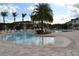 Resort-style community pool with surrounding lounge area at 3208 Cupid Pl, Kissimmee, FL 34747
