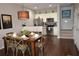 Open concept dining room with kitchen access at 3208 Cupid Pl, Kissimmee, FL 34747