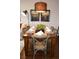 Farmhouse style dining table with seating for six at 3208 Cupid Pl, Kissimmee, FL 34747