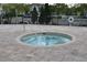 Community hot tub with surrounding brick pavers at 3208 Cupid Pl, Kissimmee, FL 34747