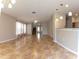 Bright and airy living room with tile flooring at 2480 Hassonite St, Kissimmee, FL 34744