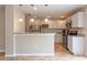 Modern kitchen with stainless steel appliances and white cabinets at 2480 Hassonite St, Kissimmee, FL 34744