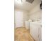 Laundry room with washer, dryer, and tile flooring at 2480 Hassonite St, Kissimmee, FL 34744