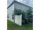 Private backyard with a wooden fence and green lawn at 2480 Hassonite St, Kissimmee, FL 34744