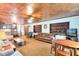 Open living room with built-in shelving and a warm, inviting atmosphere at 950 S Narcoossee Rd, St Cloud, FL 34771