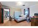 Bedroom with double bed and access to another room at 950 S Narcoossee Rd, St Cloud, FL 34771