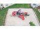 Community playground with playset, slides and sand at 5012 Laguna Bay Cir # 74, Kissimmee, FL 34746