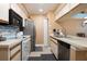 Bright kitchen with stainless steel appliances and ample counter space at 5012 Laguna Bay Cir # 74, Kissimmee, FL 34746