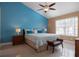 Primary bedroom with ceiling fan and neutral decor at 5012 Laguna Bay Cir # 74, Kissimmee, FL 34746