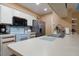 Modern kitchen with stainless steel appliances and light-toned cabinetry at 5012 Laguna Bay Cir # 74, Kissimmee, FL 34746