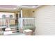 Private balcony with stairs leading down to the ground level, offering additional outdoor space at 5012 Laguna Bay Cir # 74, Kissimmee, FL 34746