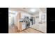 Modern kitchen with stainless steel appliances and granite countertops at 8713 Sw Rockingham Ter # D, Kissimmee, FL 34747