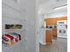 Linen closet with wire shelving, offering ample storage space at 2758 Sun Key Pl, Kissimmee, FL 34747