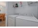 Convenient laundry room with washer and dryer included at 2758 Sun Key Pl, Kissimmee, FL 34747