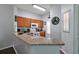 Well-equipped kitchen with granite countertops and wood cabinets at 2758 Sun Key Pl, Kissimmee, FL 34747