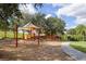 playground with shaded play structures at 2758 Sun Key Pl, Kissimmee, FL 34747