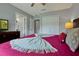 King-size bed in a well-lit and spacious bedroom at 2758 Sun Key Pl, Kissimmee, FL 34747