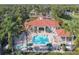 Aerial view of community pool and hot tub with surrounding lounge areas at 2758 Sun Key Pl, Kissimmee, FL 34747
