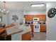 Modern kitchen featuring granite countertops and ample cabinet space at 2758 Sun Key Pl, Kissimmee, FL 34747