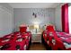 Mickey Mouse themed bedroom with two twin beds at 2758 Sun Key Pl, Kissimmee, FL 34747