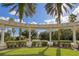 Entrance to Emerald Island Resort with a grand archway and landscaping at 2758 Sun Key Pl, Kissimmee, FL 34747