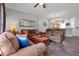 Spacious living room with open floor plan to kitchen and dining area at 2758 Sun Key Pl, Kissimmee, FL 34747